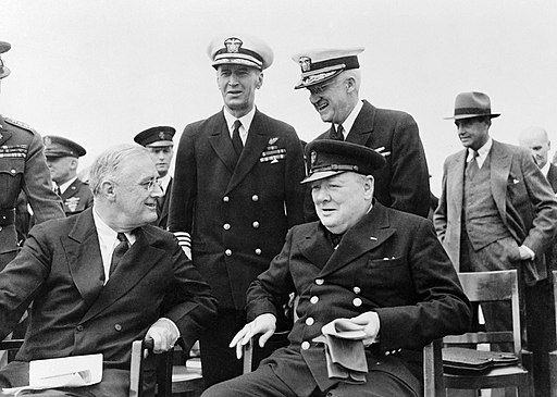 President Roosevelt in addition to Winston Churchill seated on the quarterdeck of HMS PRINCE OF WALES for the Sunday utility during the Atlantic Conference, 10 August 1941. A4816.jpg