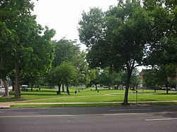 Looking south on St. Louis Ave into St. Louis Place Park.