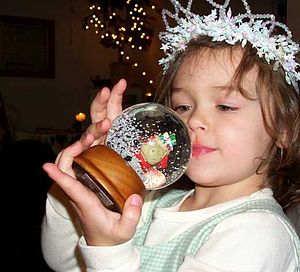 Girl with a snow globe