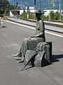 Lady waiting at the train station