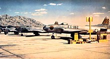 Fighter Weapons School F-80As c. 1950 in front of Frenchman Mountain, which is east of the valley USAF Fighter Weapons School F-80 44-85182.jpg