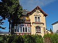 Villa mit Einfriedung