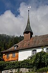 Reformierte Kirche mit Pfarrhaus und Pfrundscheune