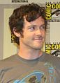 Brendan Hines interpreta Aidan