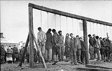 Soviet partisans hanged by German forces in January 1943 Bundesarchiv Bild 101I-031-2436-03A, Russland, Hinrichtung von Partisanen.jpg