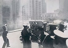 Chilean Carabineros open fire on Nacistas occupying the Seguro Obrero building, 5 September 1938. Carabineros atacan a asaltantes de Seguro Obrero.JPG
