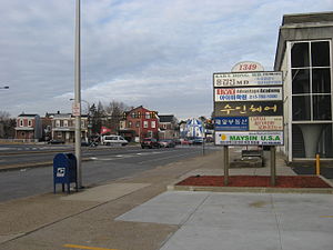 Professional offices along Cheltenham Avenue in Cheltenham, one of several areas in the Delaware Valley encompassing Greater Philadelphia that has a significant Korean population. In the background is the northern terminus of Broad Street.