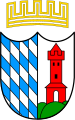 Große Kreisstadt Günzburg Gespalten; vorne die bayerischen Rauten, hinten in Silber auf grünem Dreiberg ein roter Zinnenturm mit Spitzdach und offenem Tor.