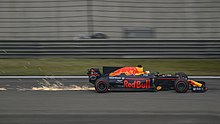 Daniel Ricciardo driving the RB13 at the Chinese Grand Prix Daniel Ricciardo (33545213330).jpg