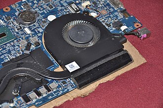 Typical heatsink-fan combination found on a consumer laptop. The heatpipes which contain a working fluid make direct contact with the CPU and GPU, conducting heat away from the component and transferring it to the fin-stack mounted on the exhaust port of the cooling fan. The fin-stack acts as a fluid-to-fluid heat exchanger transferring thermal energy from the working fluid within the heatpipe(s) to ambient air at dead-state condition. Laptop Heatsink.jpg