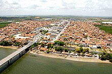 The Do Sal River at bottom; bridge to the left; the city of Nossa Senhora do Socorro top 2/3rds of photo