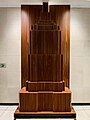 A statue of the tower itself within the resident lobby entrance in the Deco Tower.