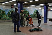 Musicians perform in the Delancey Street/Essex Street station in 2011. Subway musicians (6337954877).jpg