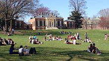 Students socializing on "the Beach" with Homewood House in the background The Beach, JHU.jpg