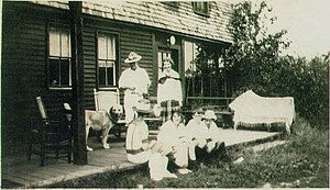 Chinook, Arthur, Katherine, and neighbors on their porch at Wonalancet Farm Walden-kate-chinook-friends-at-wonalancet.jpg