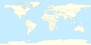 Mapa konturowa świata, u góry nieco na lewo znajduje się punkt z opisem „Québec”
