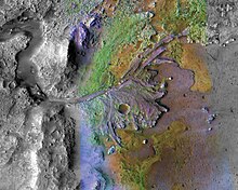 The Jezero crater delta on Mars, where the Perseverance rover and Ingenuity helicopter landed. Clays are visible as green in this false color CRISM / CTX image. 260184-JezeroCrater-Delta-Full.jpg