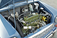 The bonnet on this original Mini is open, showing the transversely mounted engine that drives the front wheels. BMC Mini 021.jpg
