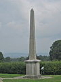 Bodelwyddan Castle. Obelisk in Garden.