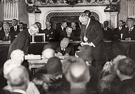 German Foreign Minister Gustav Stresemann signing