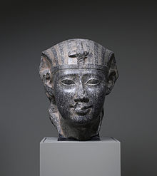 This granite statue depicts Ptolemy II in the traditional canon of ancient Egyptian art. Walters Art Museum, Baltimore.