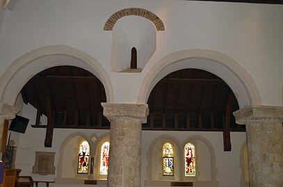 Norman pillars and Saxon window