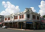 Double storey building with a facade of plaster and face brick. Decorative elements on top storey, Property purchased by P G Croxford in 1907 for 1700 pounds. Type of site: Commercial Current use: Commercial :Shop. A landmark in Kimberley. Part of a group of interesting buildings e.g. Kimberley Club, Alexander McG