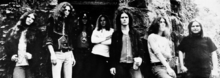 Burns with Lynyrd Skynyrd in 1973 (from left to right): Gary Rossington, Allen Collins, Leon Wilkeson, Ronnie Van Zant, Billy Powell, Burns and Ed King. Lynyrd Skynyrd (1973).png
