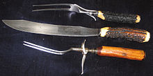 Carving knife and carving forks. Note folding fork guards. Old carving knife and forks.JPG