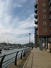 New apartments blocks with boats moored in the marina.