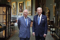 President Joe Biden meets with King Charles III at Windsor Castle, Windsor, England (2023) President Joe Biden and His Majesty King Charles III pose for a photograph.jpg