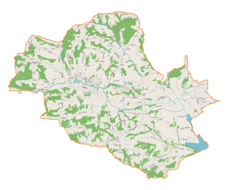 Mapa konturowa gminy Siepraw, blisko centrum na lewo znajduje się punkt z opisem „Siepraw”
