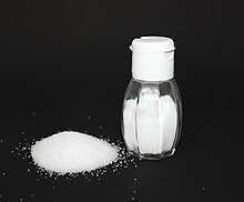 Westerners are evolving to have lower blood pressures because their modern diets contain high amounts of salt (NaCl), which raises blood pressure. Table salt with salt shaker V1.jpg