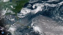 Satellite picture showing Chris (top left) near North Carolina and the remnants of Hurricane Beryl (bottom) near Hispaniola