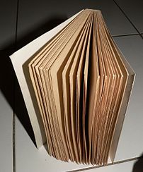 An uncut book after bookbinding from folded pa...