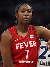 Woman in basketball jersey