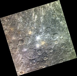 Approximate color image showing Amaru Facula (above left of center) and Nākahi Facula (below right of center), as yellowish spots.