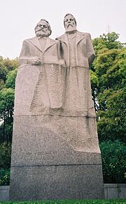 A monument dedicated to Karl Marx (left) and Friedrich Engels (right) in Shanghai Marx et Engels a Shanghai.jpg