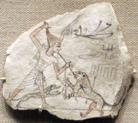 Ancient Egyptian ostracon of a lion being hunted with a spear, with the help of a dog, at Thebes