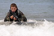 Third Phase A trainee carries out an over the beach exercise on San Clemente Island.