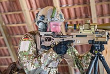 A German KSK member wearing the new Bundeswehr Multitarn camo pattern. Urban Sniper 220504-A-UI440-1032.jpg