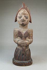 Figure of a Devotee of Shango Holding an Oshe Shango, Brooklyn Museum Brooklyn Museum 22.1518 Figure of a Devotee of Shango Holding an Oshe Shango.jpg