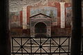 Fountain with flanking murals