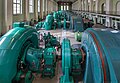 Image 11 Walchensee Hydroelectric Power Station Photograph credit: Diego Delso The Walchensee Hydroelectric Power Station is a storage power station in Bavaria, Germany. The turbines, seen here, are fed by water from the Walchensee which is then released into the Kochelsee. The power station uses the hydraulic head of about 200 metres (660 ft) between the two natural lakes, and water from the Rißbach river is also used to augment the supply. The installed capacity is 124 MW with an annual production of 300 GWh; this is one of the largest of such power plants in Germany. More selected pictures