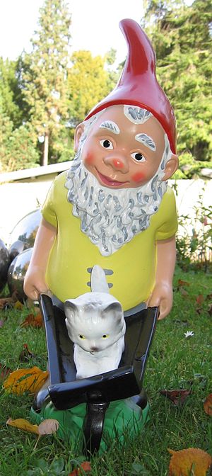 Garden gnome with wheelbarrow
