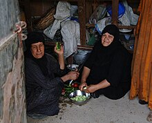 Iraqi women in their kitchen preparing a meal for a luncheon.jpg