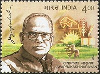Jayaprakash Narayan on a 2001 stamp of India. He is remembered for leading the mid-1970s opposition against Prime Minister Indira Gandhi and the Indian Emergency, for whose overthrow he had called for a "total revolution". Jayaprakash Narayan 2001 stamp of India.jpg