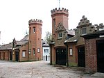 Left Gateway Turret to Stable Yard at Ketteringham Hall incorporating a Greek Marble, with Attached Range