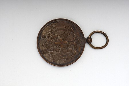Реверс медаље за ревносну службу, Народни музеј Краљево.