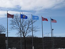 Flags fly at Augsburg, during the 25th annual Nobel Peace Prize Forum (2013). Nobel Peace Prize Flags at Augsburg.jpg